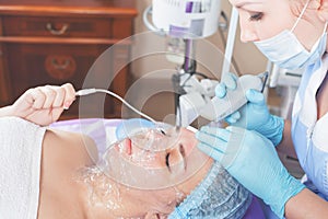 Ultrasonic cleaning of the face rejuvenation