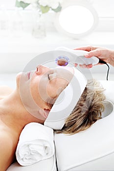 Ultrasonic facial massage, light phototherapy.