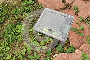 The ultrasonic pest repeller of moles is installed on the solar battery. photo
