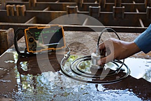 Ultrasonic test to detect imperfection or defect of steel plate photo