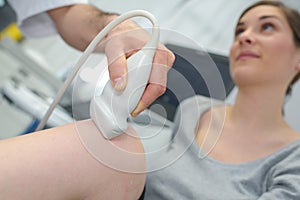 Ultrasound echo on knee woman