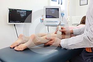 Ultrasound of girl`s knee-joint