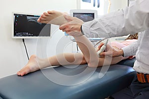 Ultrasound of girl`s knee-joint - diagnosis