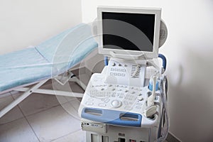 Ultrasound machine and examination table in hospital, above view
