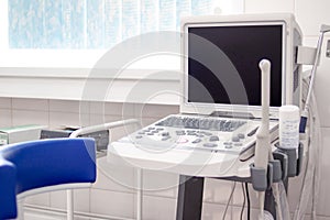 Ultrasound scanner equipmentin in clinic hospital. Diagnostics, sonography and health concept. Copyspace