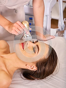 Ultrasound therapy for skin tightening in beauty spa salon