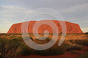 uluru ayers-rock at cloudy sunset