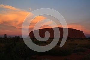 uluru ayers-rock at cloudy sunset