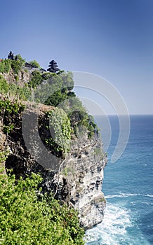 Uluwatu ancient landmark clifftop balinese hindu temple in bali photo