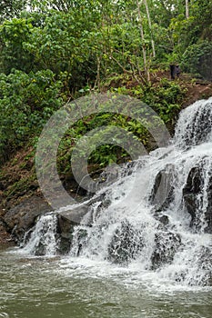 Uma Anyar waterfall, Bali, Indonesia. Jungle, forest, daytime with cloudy sky