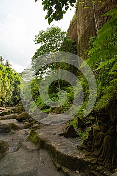 Uma Anyar waterfall, Bali, Indonesia. Jungle, forest, daytime with cloudy sky