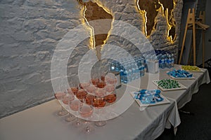 Event refreshment table with drinks and snacks