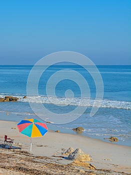 A Umbrella on the beach  of the Atlantic Ocean, at Marineland Beach in Marineland, Flagler County, Florida