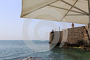 Umbrella for protection against rain and sun