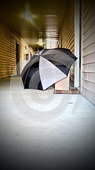 Umbrella sheilds package in apartment breezeway