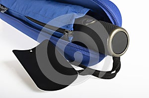 Umbrella with sleeve in hard case isolated on white