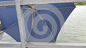 An umbrella with a spider web