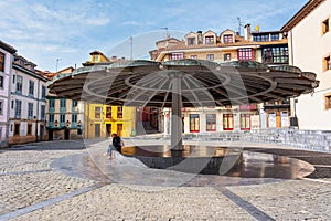 The Umbrella Square with picturesque buildings of striking colors in the surroundings of the square, Oviedo, Asturias. photo