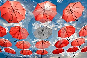 Umbrella standing out from the crowd unique concept mental health depression