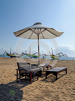 Umbrella and sun chair