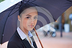 Umbrella, travel or businesswoman in portrait or city for legal justice, commute and pride with protection. Outdoor
