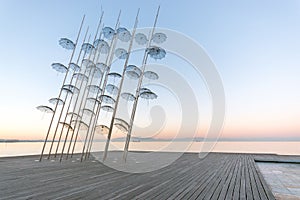 The `Umbrellas` installation at the New Waterfront of Thessaloniki during sunrise in Greece