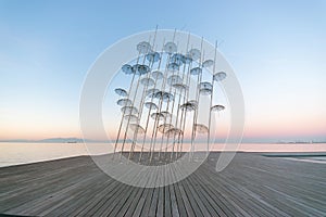 The `Umbrellas` installation at the New Waterfront of Thessaloniki during sunrise in Greece