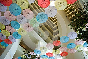 Umbrellas in the interior. hotel interior with umbrellas
