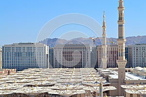 Umbrellas and Minarets in Prophet's Mosque photo