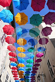 Umbrellas over a street in Aurillac