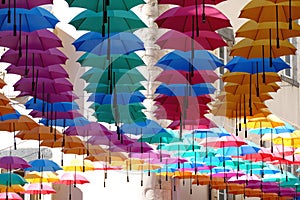 Umbrellas over a street in Aurillac