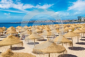 Umbrellas on public beach in Estoril