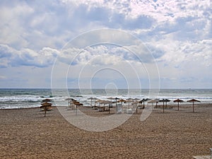 Umbrellas and seats in Beach in Pueblo Indalo Mojacar