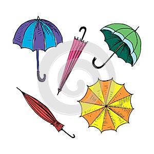 Umbrellas set. Collection of isolated painted colored umbrellas. Multicolor bright doodle illustration. Hand drawn