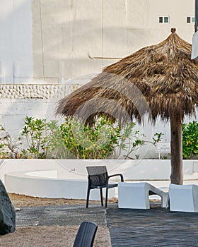 umbrellas and some beds to lie down to contemplate the sunset or to sunbathe by