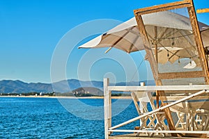 umbrellas and some beds to lie down to contemplate the sunset or to sunbathe by