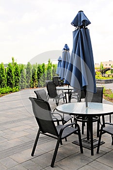 Umbrellas, tables & chairs, QC, Canada