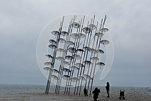 Umbrellas at the beach, sculpture of Giorgos Zongolopoulos