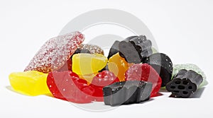 Mixed candy with sugar on white background in studio light