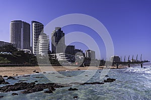 Umhlanga beach and beachfront buildings during summer