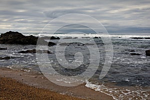 Umhlothi Beach looking into the ocean with the rocks and waves