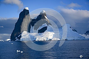 Una peaks, two towers of basalt on the entrance to Lemaire Channel , Antarctic Peninsula photo