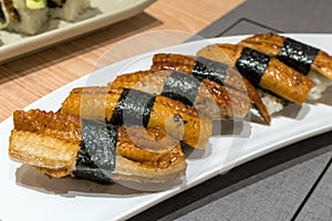 Unagi Eel Sushi on White Ceramic Plate