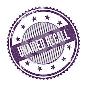 UNAIDED RECALL text written on purple indigo grungy round stamp