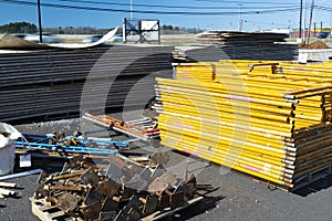 Unassembled Scaffolding Stacked On Construction Job Site