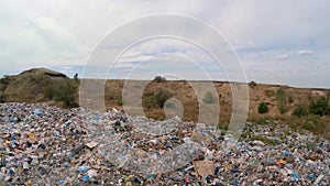 Unauthorized dump in a quarry near a road. bird`s-eye view.