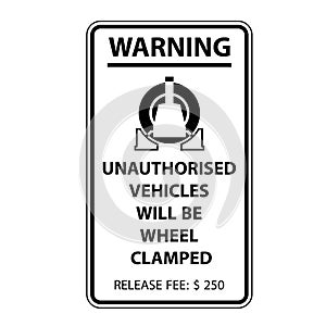 Unauthorized parking sign, wheel clamping notice - car wheel clamp photo