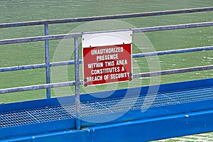 A unauthorized presence within the area is a security breach sign