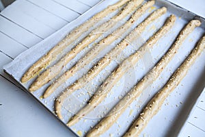 Unbaked homemade bread spelt sticks