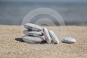 Unbalanced stones on beach